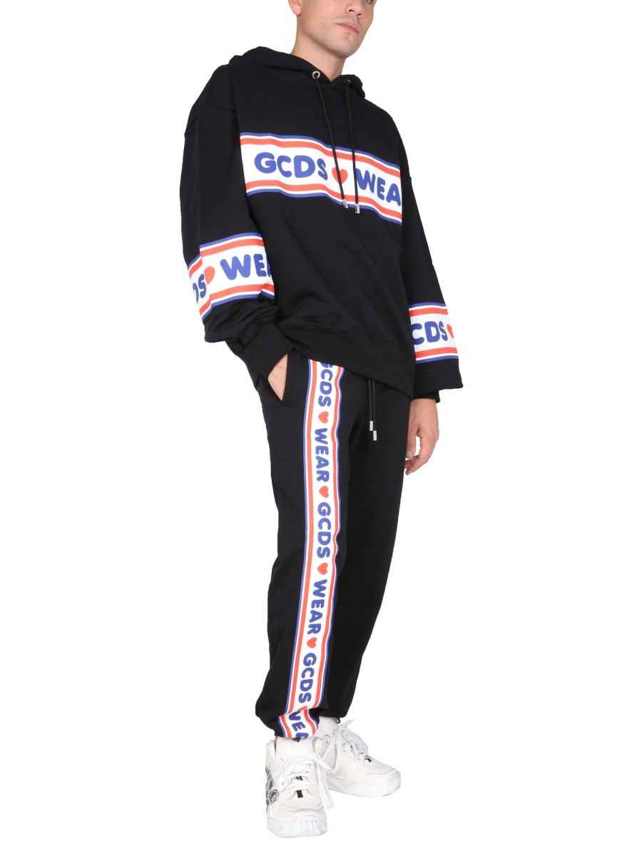 JOGGING PANTS WITH "CUTE TAPE" LOGO BAND