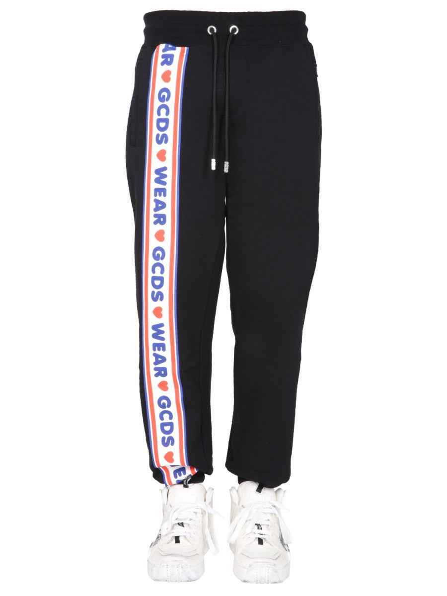 JOGGING PANTS WITH "CUTE TAPE" LOGO BAND