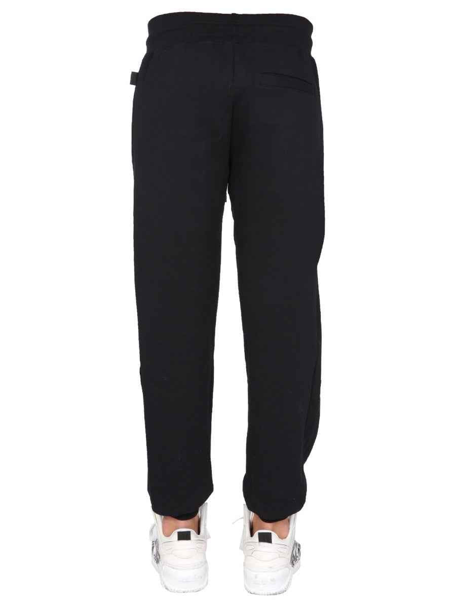 JOGGING PANTS WITH "CUTE TAPE" LOGO BAND