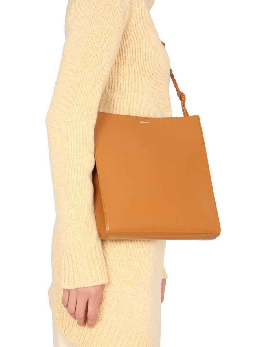 LONG ASYMMETRIC SWEATER