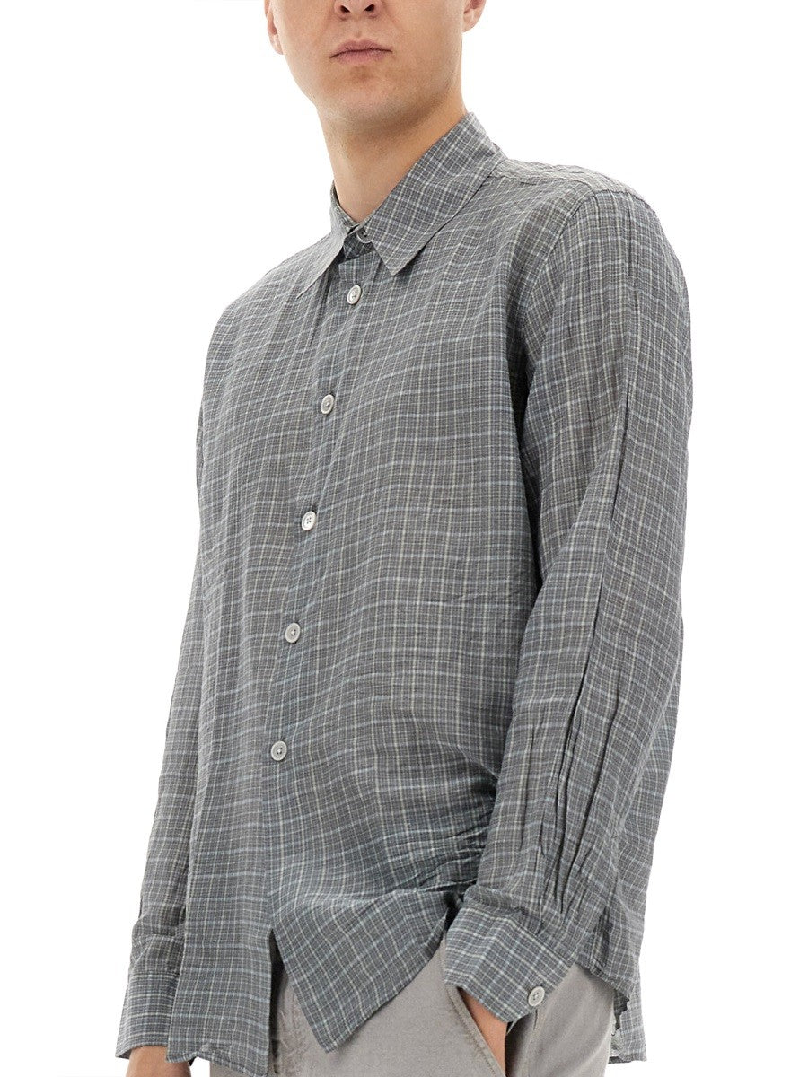 AU-DELÀ DE LA CHEMISE