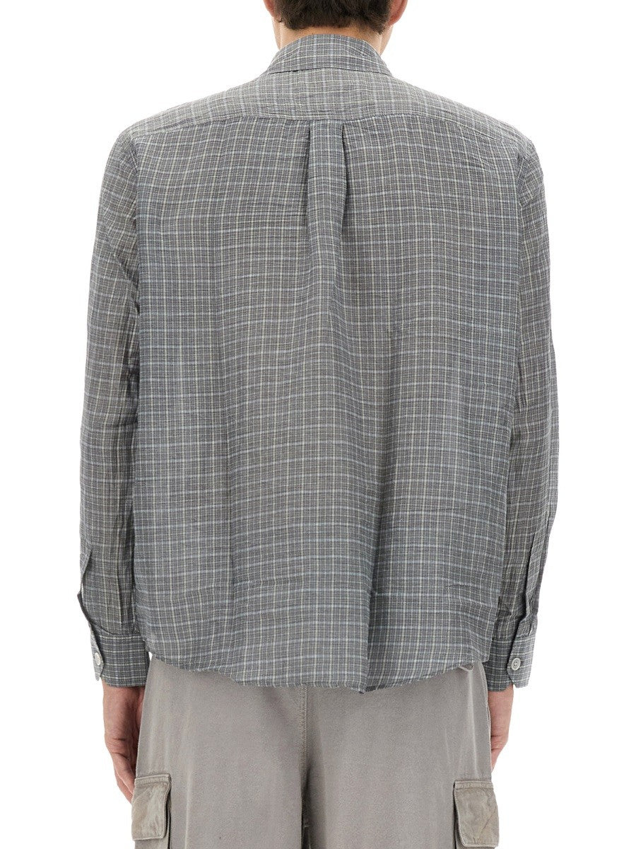 AU-DELÀ DE LA CHEMISE