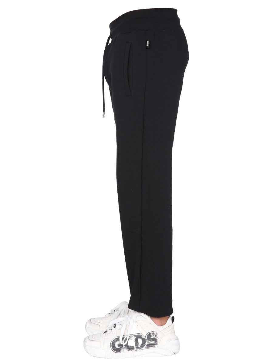 JOGGING PANTS WITH "CUTE TAPE" LOGO BAND