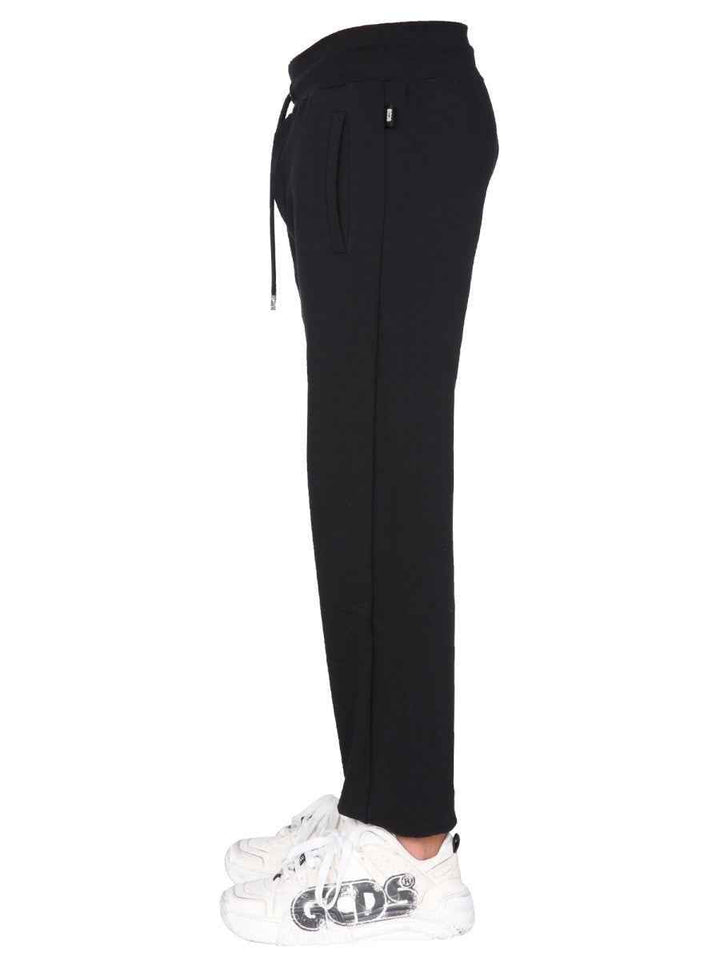 JOGGING PANTS WITH "CUTE TAPE" LOGO BAND