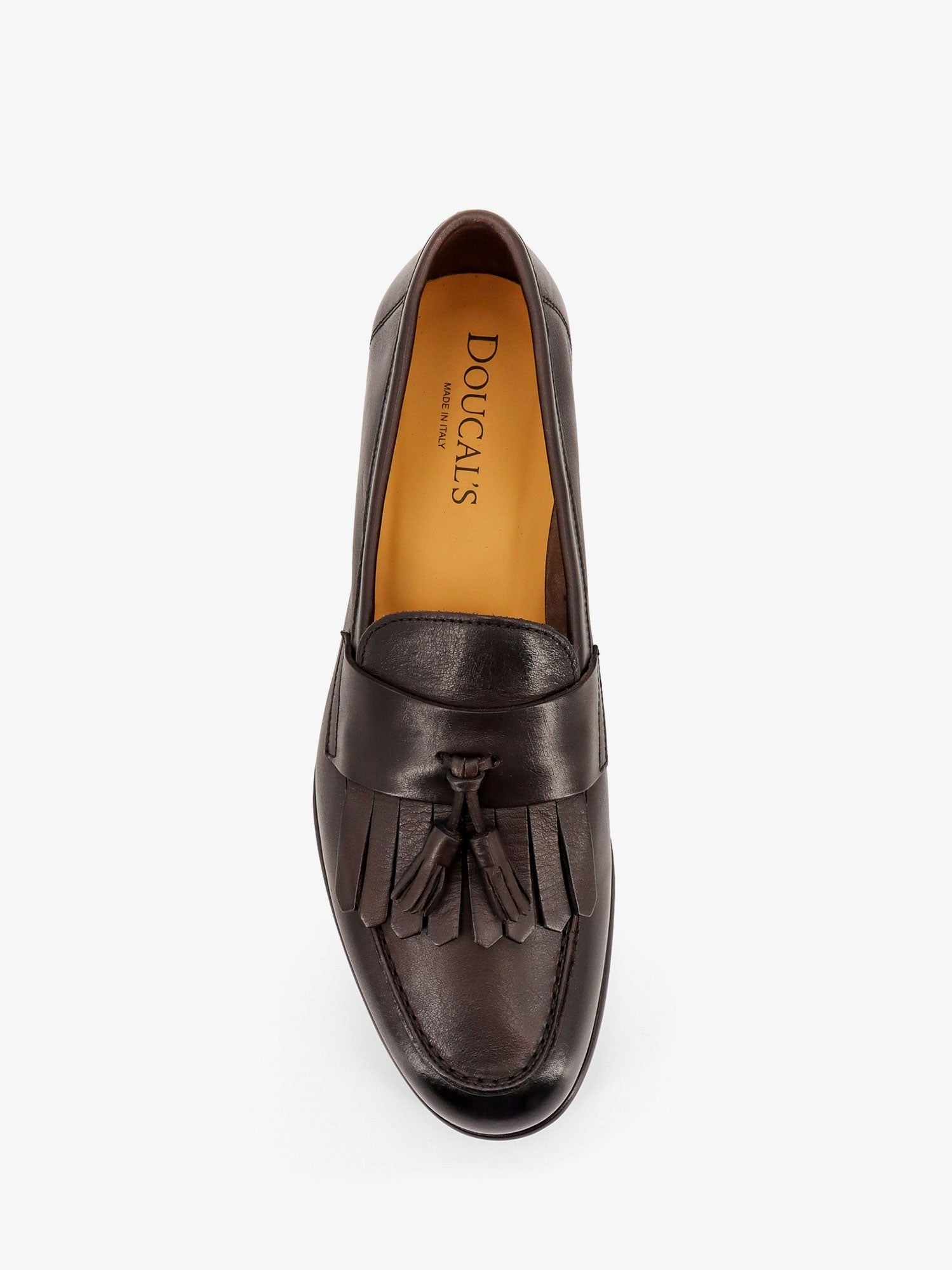Mocassin en cuir avec pompons emblématiques