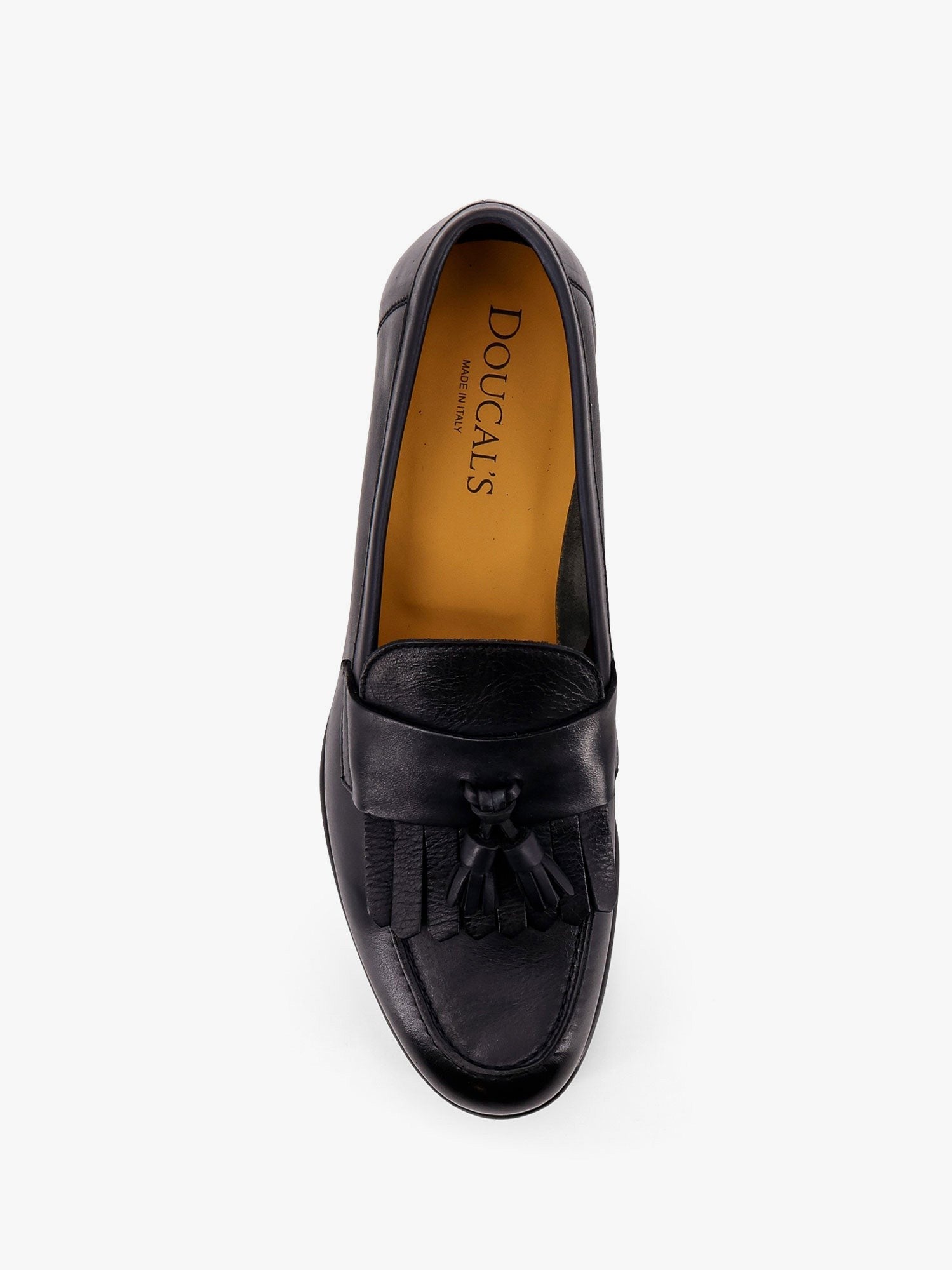 Mocassin en cuir avec pompons emblématiques