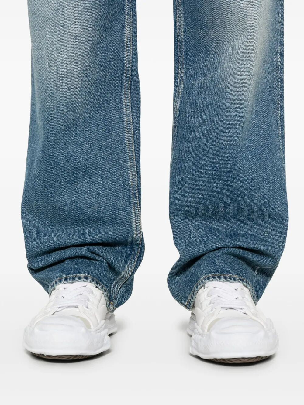 whiskering-effect jeans
